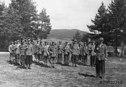 Grupppebilde. Menn i uniform