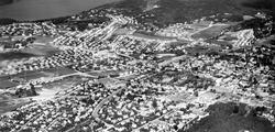 Flyfotografi av Sarpsborg by ca. 1962-63. Forsvarets flyskva