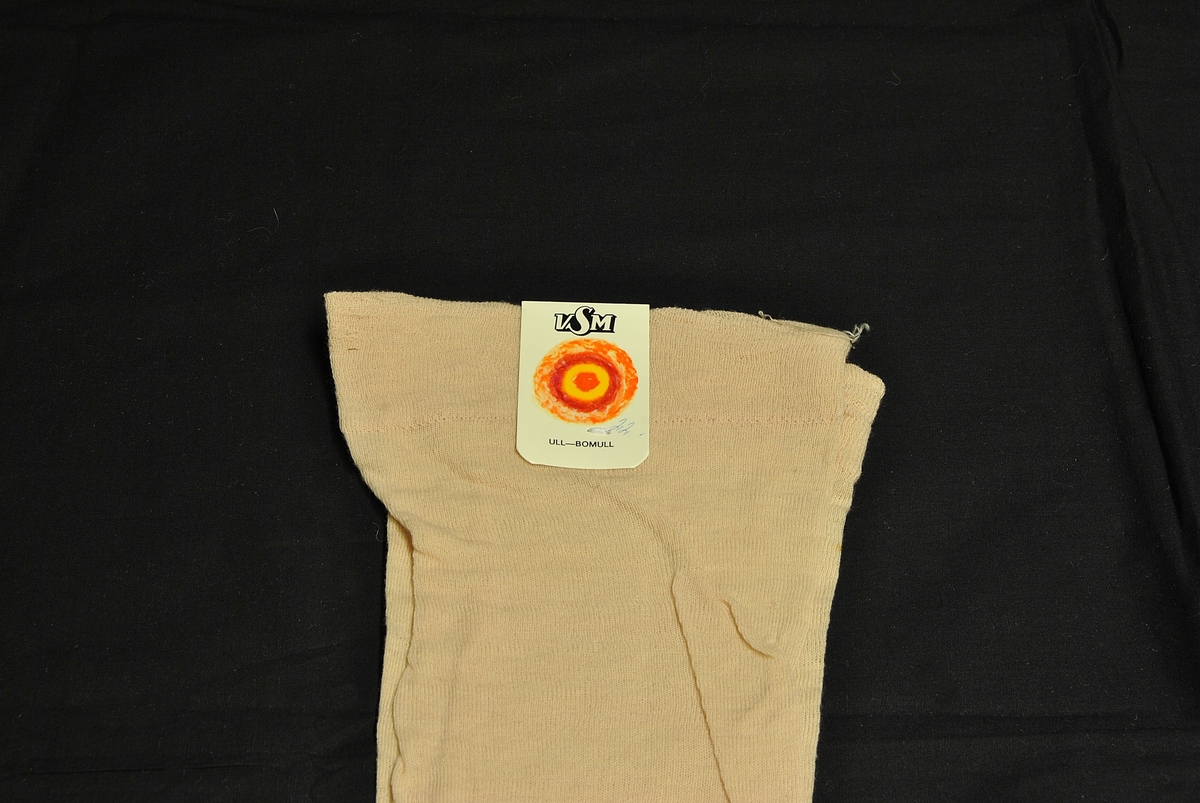 Ubrukte, lårlange strømper.