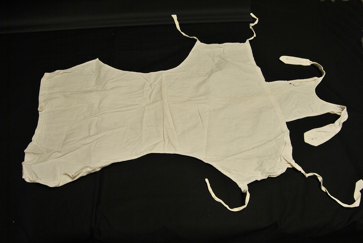 Bleiebukse med knytinger og seler.