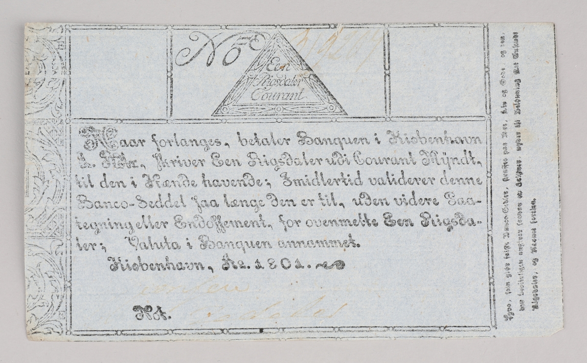 Dansk pengeseddel pålydende En Rigsdaler Courant fra 1801. Med vannmerker, og uthevede stempler i øvre hjørner