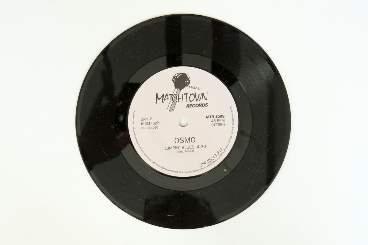 Singel-skiva av svart vinyl med vit pappersetikett, i omslag av vikt papper med tryckta fotografier, i plastficka.

Låtlista
Sida 1: Störst av allt är kärleken
Sida 2: Jumpin' blues

JM 55178:1, Skiva
JM 55178:2: Omslag/vikt papper
JM 55178:3, Plastficka