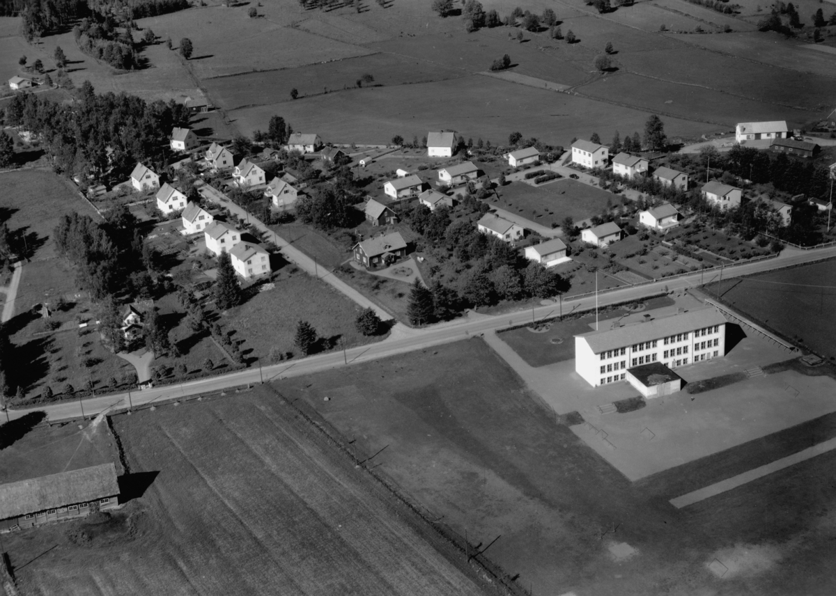 Flygfoto över Landsbro i Vetlanda kommun, Jönköpings län. Nr: 439/1957