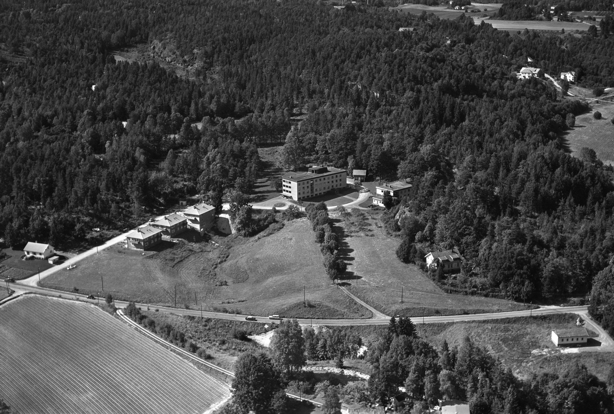 Flyfotoarkiv fra Fjellanger Widerøe AS, fra Porsgrunn Kommune. Mule pleiehjem. Fotografert av Edmond Jaquet 27.07.1963.
