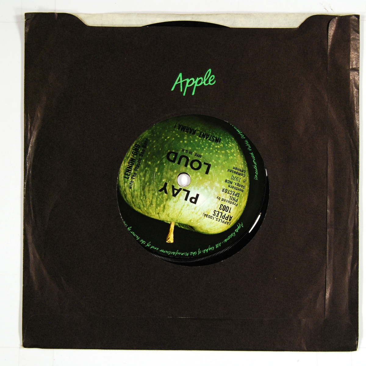 Plateetiketten viser et grønt eple på A-siden og et delt eple på B-siden.