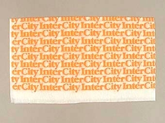 Antimakass med orange text "Inter City" på vit botten
bxh, utvikt 310x330 mm
