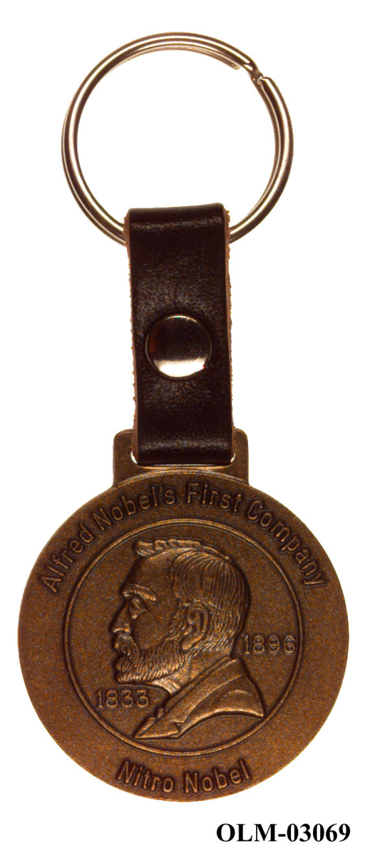 Bronsefarget nøkkelring med motiv av Alfred Nobel i profil.