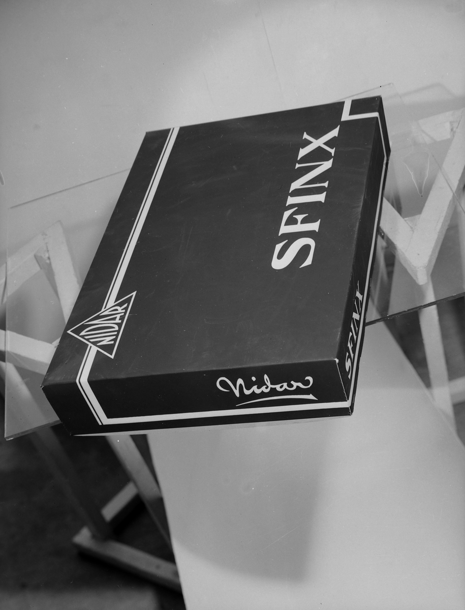 Reklame for Sfinx fra Nidar Chokoladefabrik A/S.