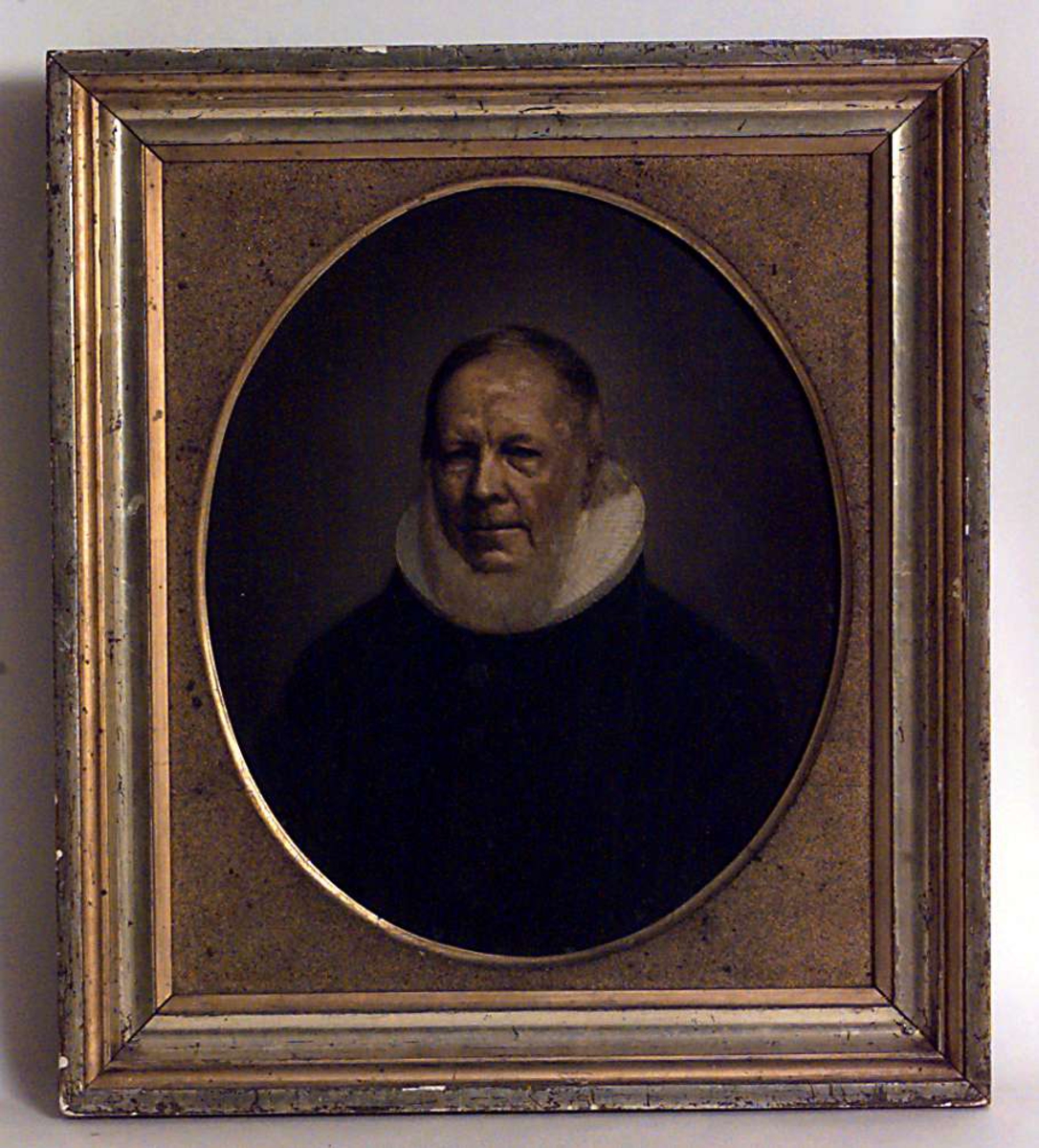 Portrett, brystbilde av sogneprest A.W Wexels i prestekjole med pipekrage.