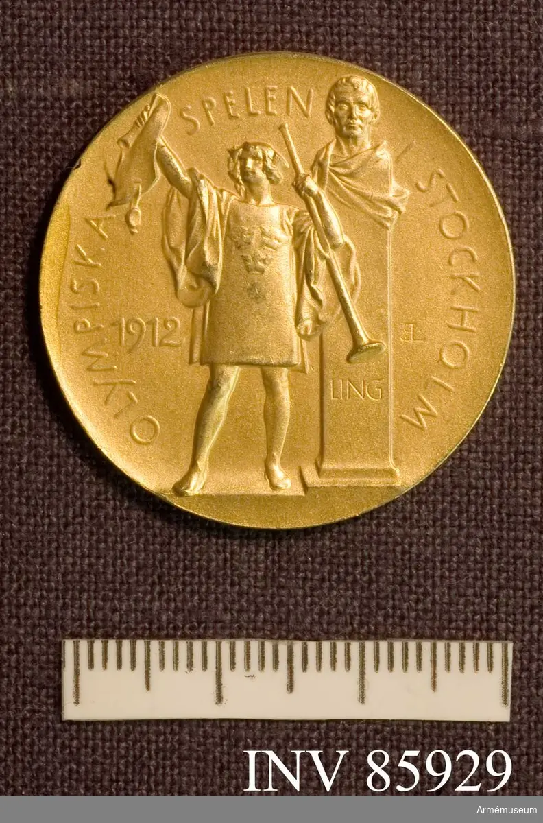 Grupp M II.
Guldmedalj vunnen av Oscar Gomer Swahn i löpande hjort, enkelskott, lag, OS 1912 i Stockholm.